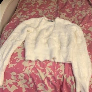 Fluffy white sweater